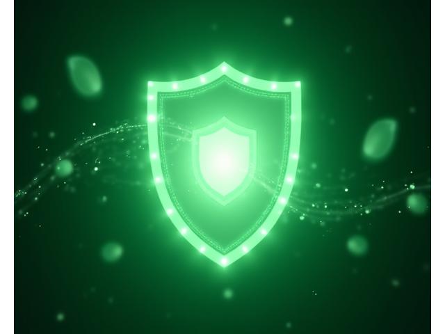 Abstract image representing data security, with glowing shield icons and intertwined digital lines on a soft green-blue background.